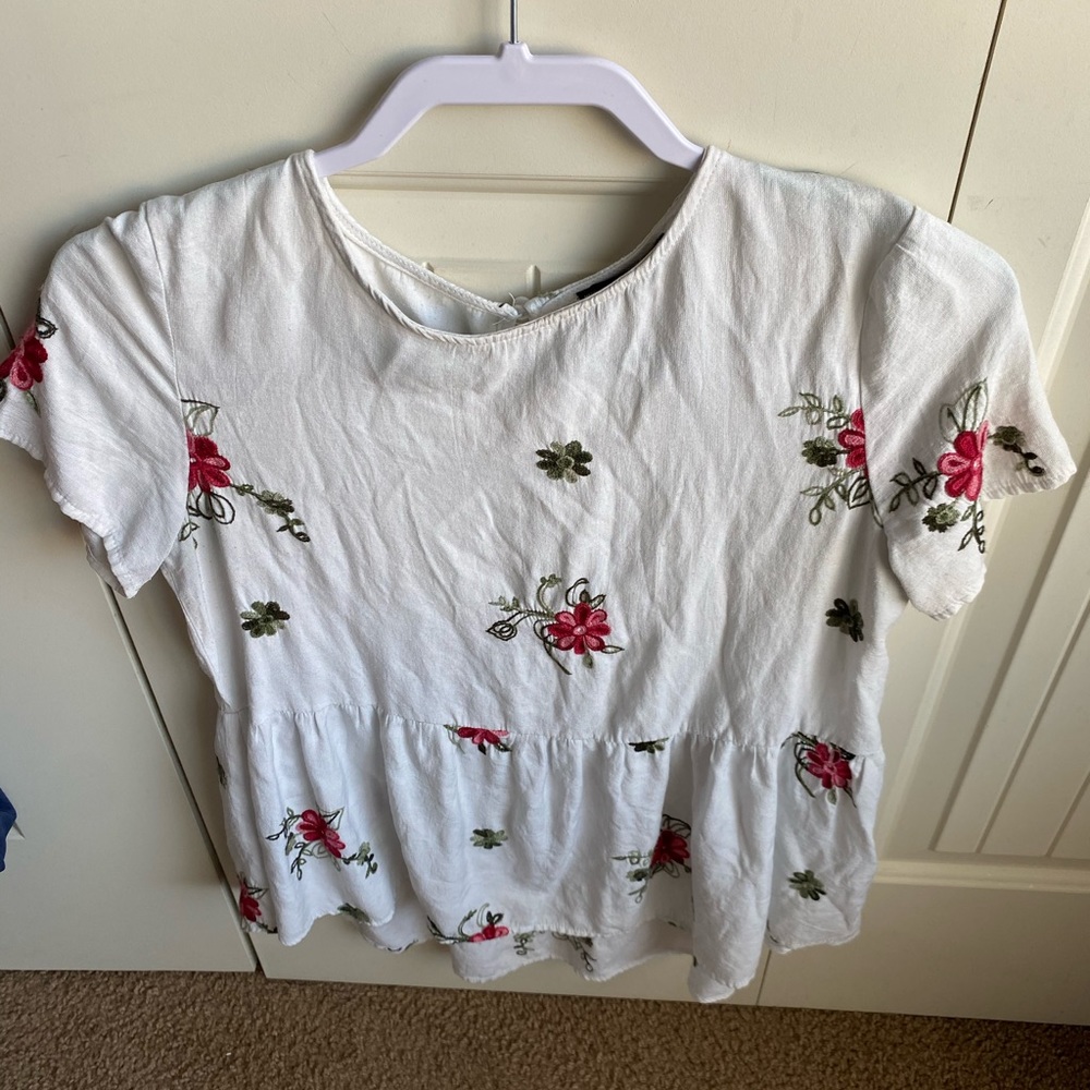 White shirt with red flowers